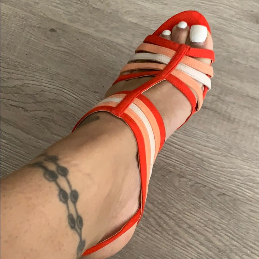 Different shades of orange heels